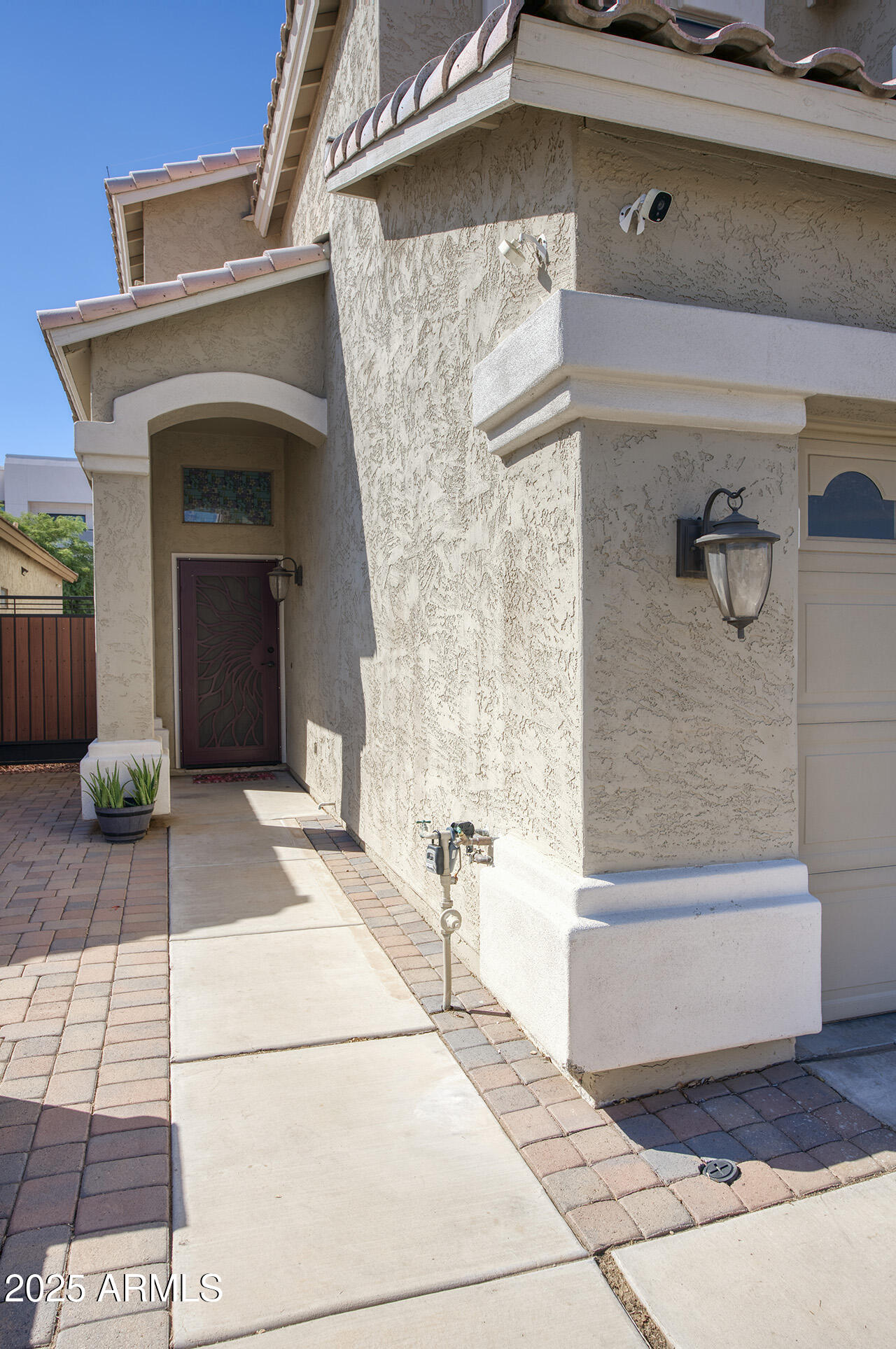 10617 West Coronado Road Avondale, AZ 85392 - Photo 2 of 32 a view of a hallway with seating area