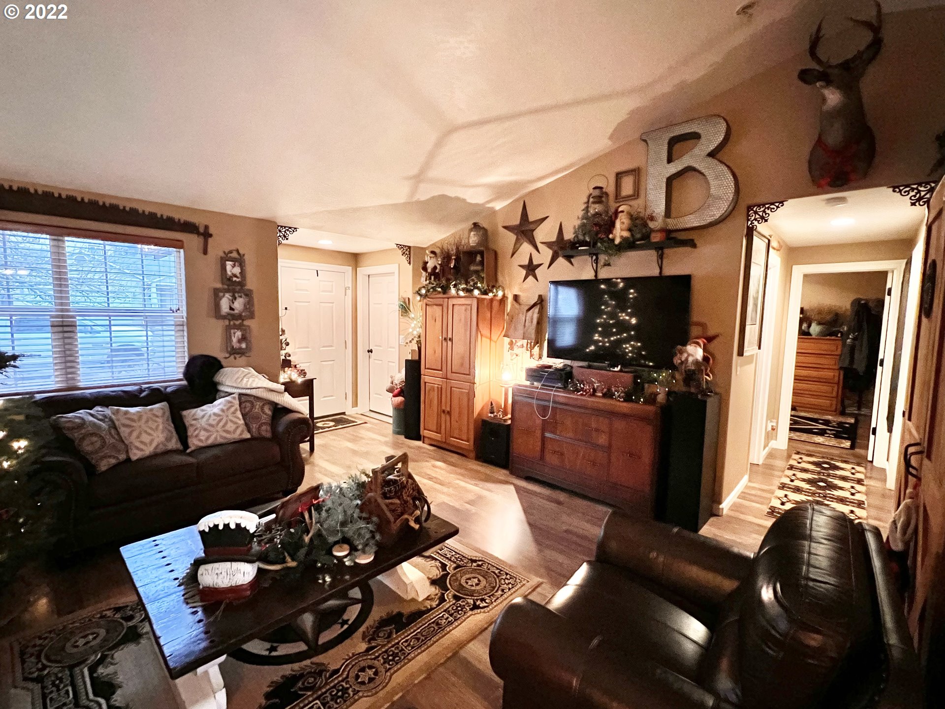 1654 South 59th Street Springfield, OR 97478 - Photo 3 of 15 a living room with furniture and wooden floor