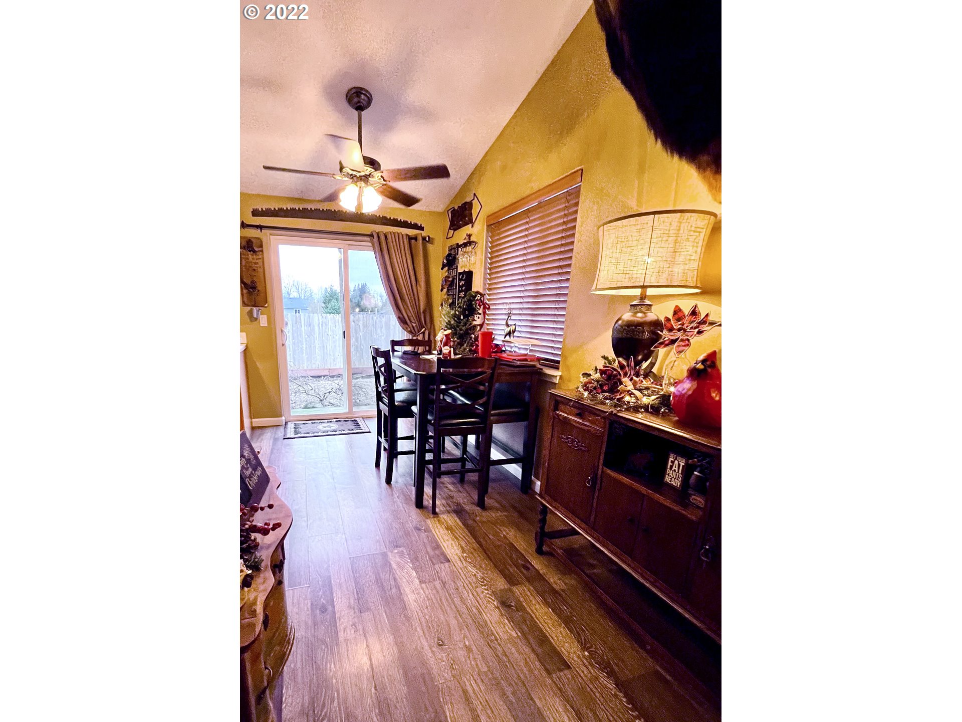 1654 South 59th Street Springfield, OR 97478 - Photo 5 of 15 a view of a dining room with furniture and wooden floor