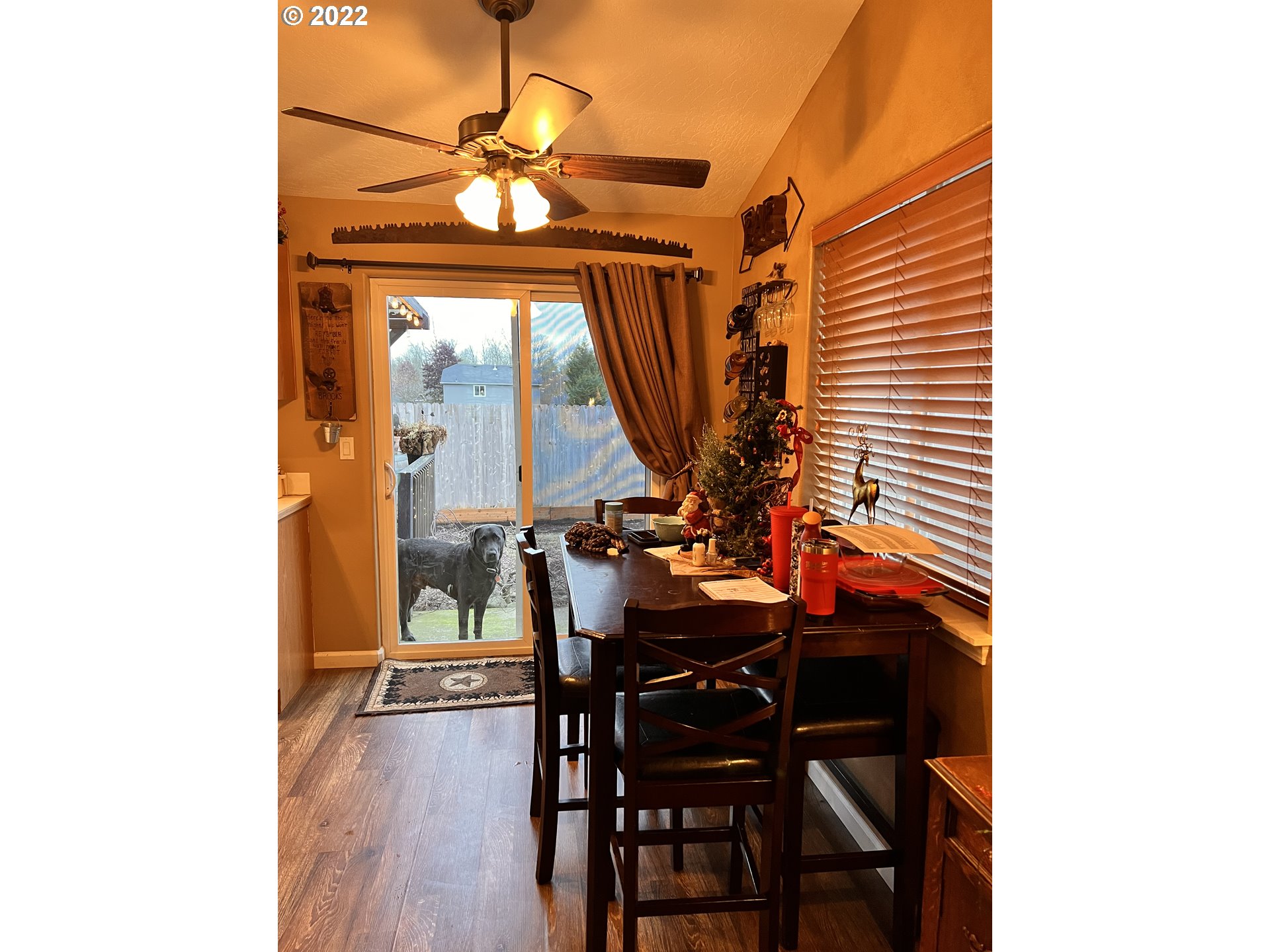 1654 South 59th Street Springfield, OR 97478 - Photo 6 of 15 a view of a dining room with furniture and a window