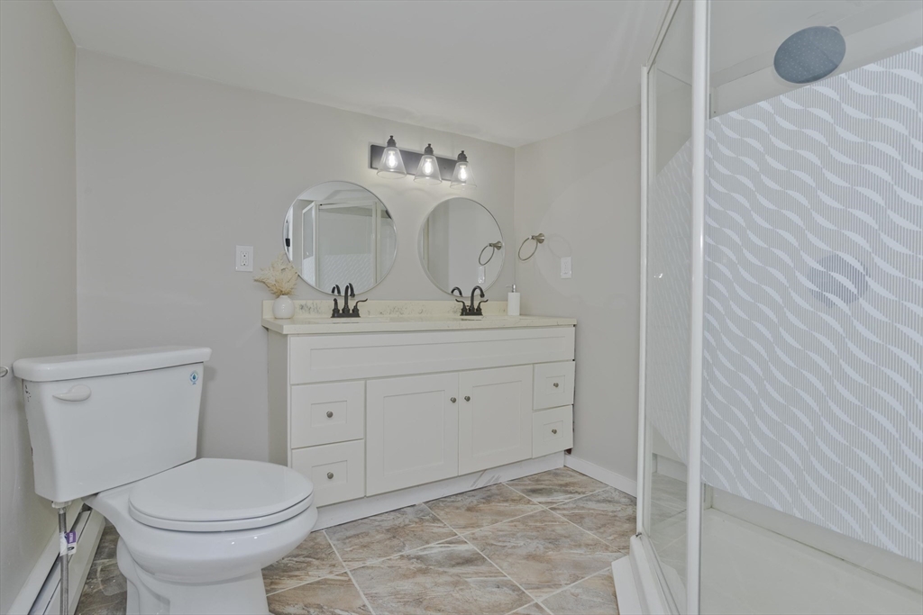 8 Summit Drive Palmer, MA 01069 - Photo 19 of 40 a bathroom with a sink toilet and shower