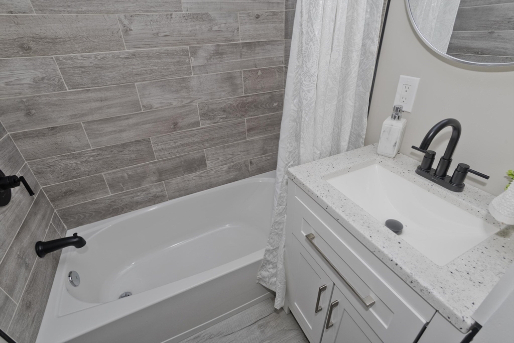 8 Summit Drive Palmer, MA 01069 - Photo 22 of 40 a bathroom with a sink and a bathtub