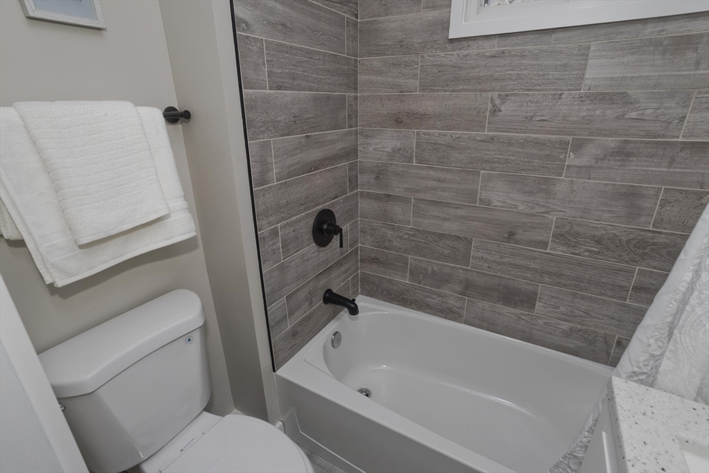 8 Summit Drive Palmer, MA 01069 - Photo 23 of 40 a bathroom with a toilet and shower