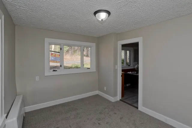 a view of a house with a swimming pool