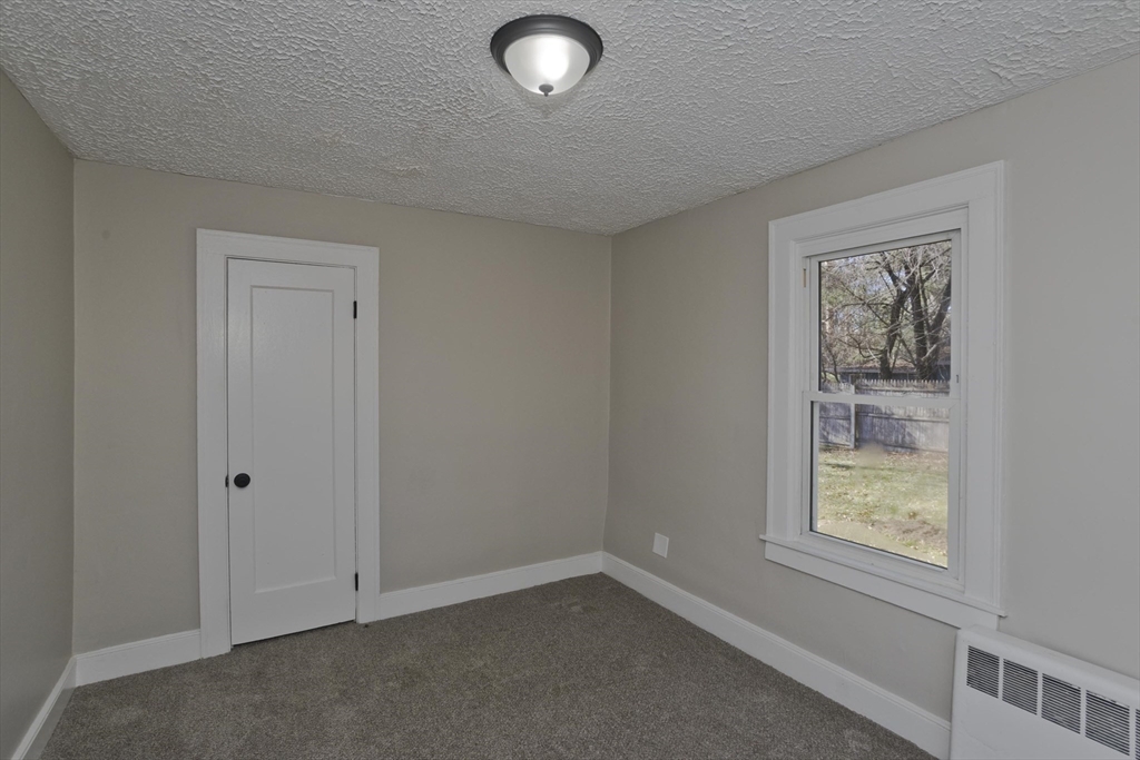 8 Summit Drive Palmer, MA 01069 - Photo 26 of 40 an empty room with windows
