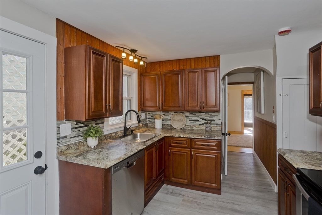 8 Summit Drive Palmer, MA 01069 - Photo 5 of 40 a kitchen with stainless steel appliances granite countertop a sink stove and refrigerator