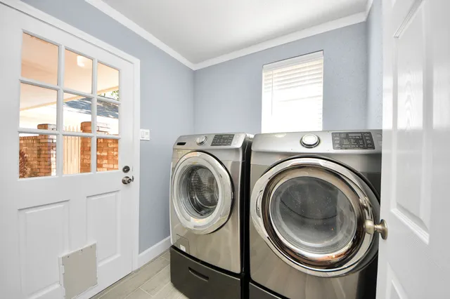 a utility room with dryer and washer