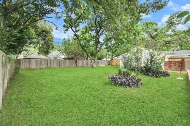 a front view of house with garden