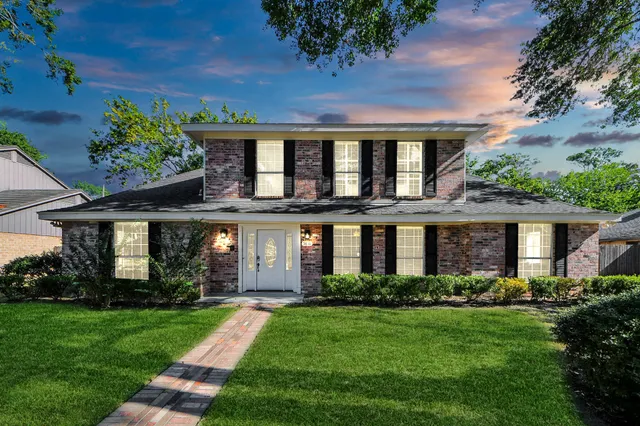 front view of house with a yard