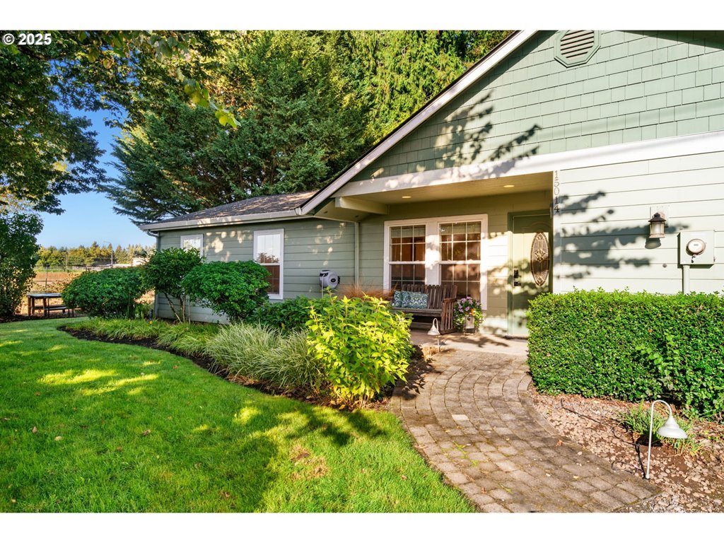 15014 Northeast Caples Road Brush Prairie, WA 98606 - Photo 1 of 39 a view of a house with a yard