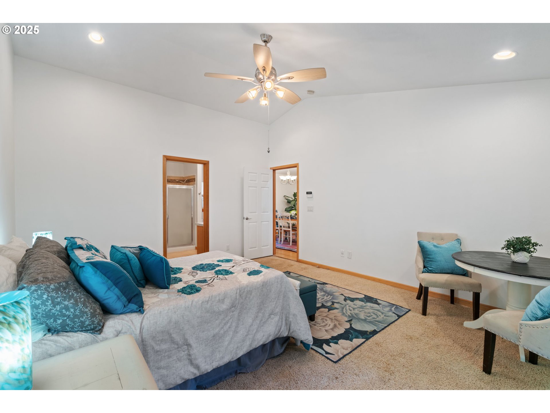 15014 Northeast Caples Road Brush Prairie, WA 98606 - Photo 15 of 39 a bedroom with a bed window and a chair