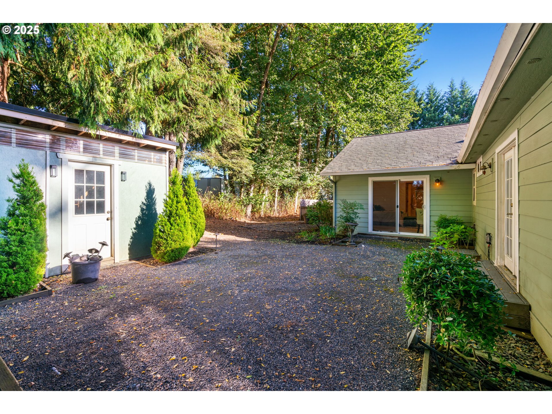 15014 Northeast Caples Road Brush Prairie, WA 98606 - Photo 30 of 39 a view of a house with a yard and potted plants