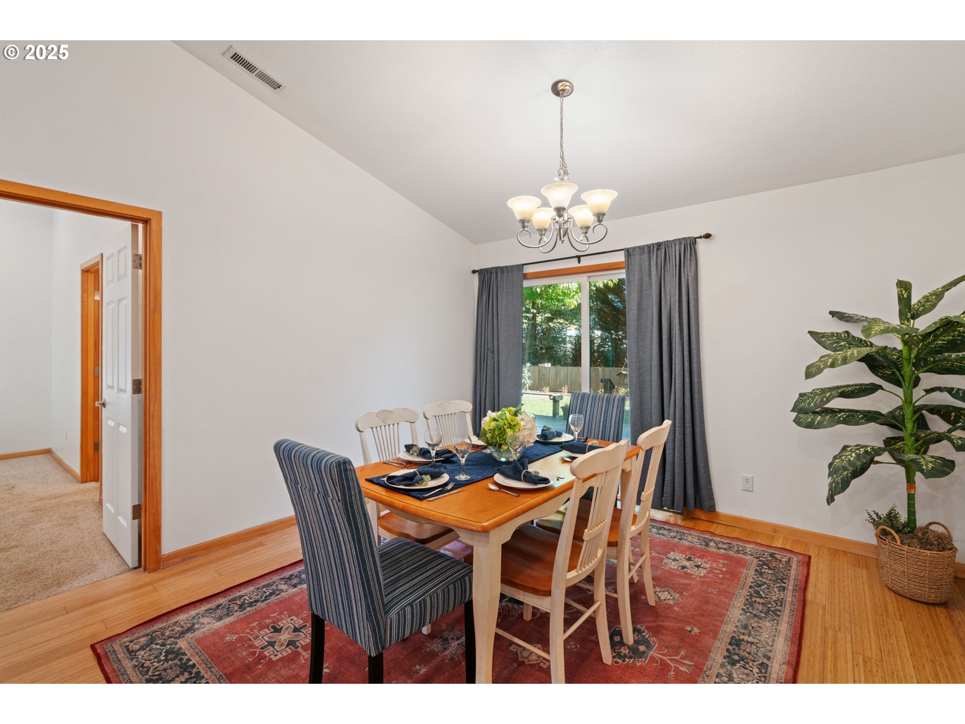 15014 Northeast Caples Road Brush Prairie, WA 98606 - Photo 10 of 39 a view of a dining room with furniture window and wooden floor