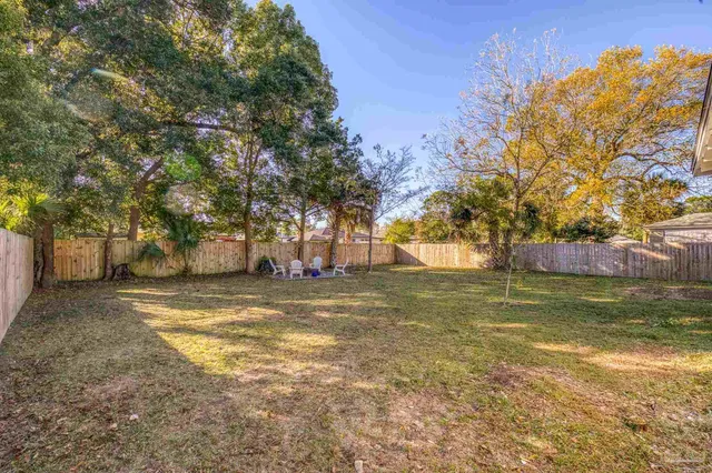 a view of a yard with a trees
