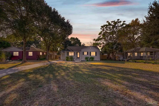 a view of a trees in front of a building