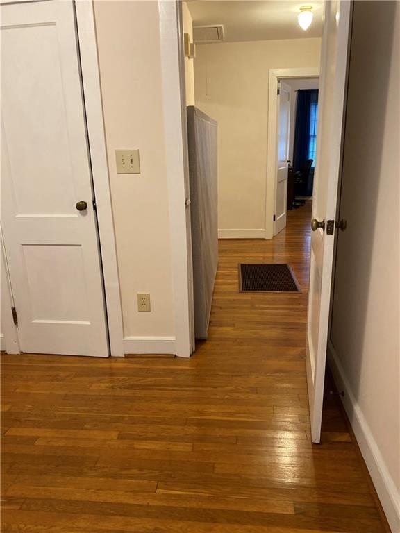 79 Ayers Avenue Marietta, GA 30060 - Photo 13 of 16 a view of entryway with wooden floor