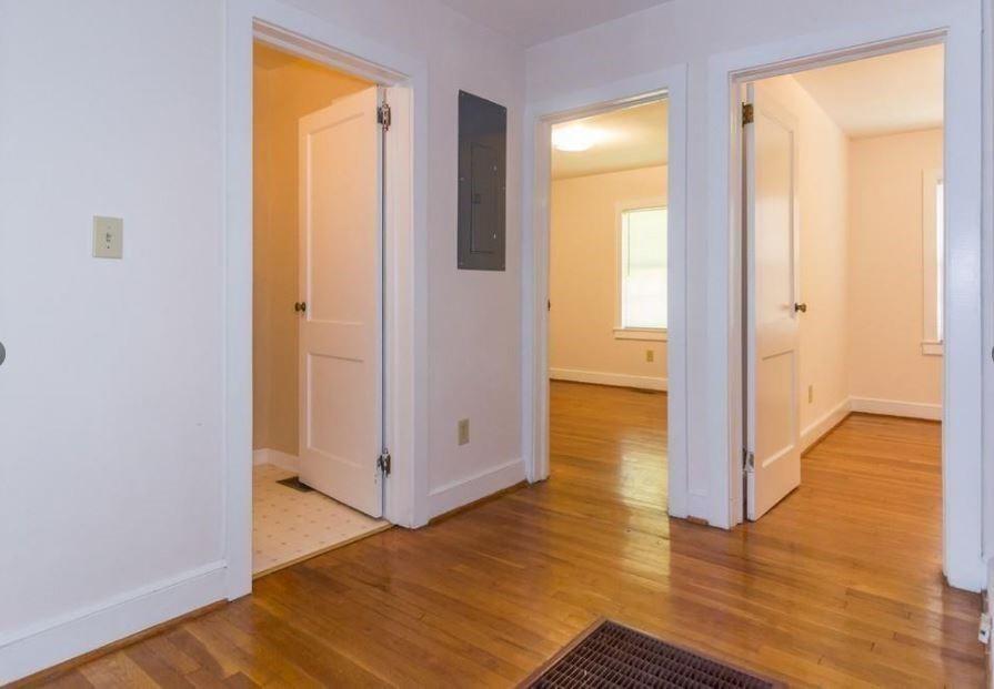 79 Ayers Avenue Marietta, GA 30060 - Photo 4 of 16 a view of a hallway with wooden floor