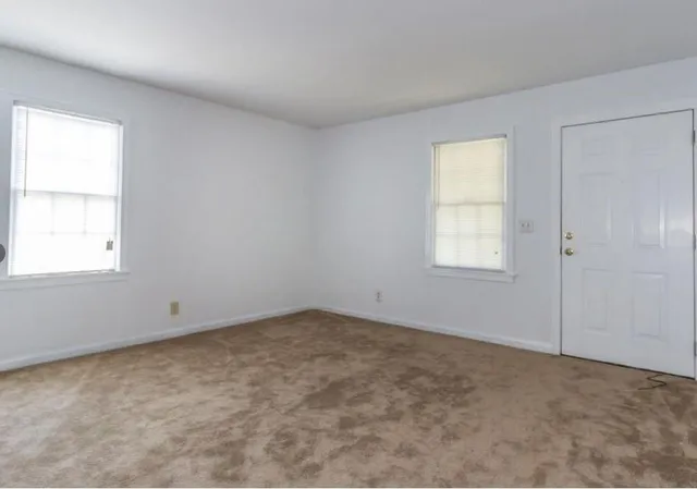 an empty room with a window