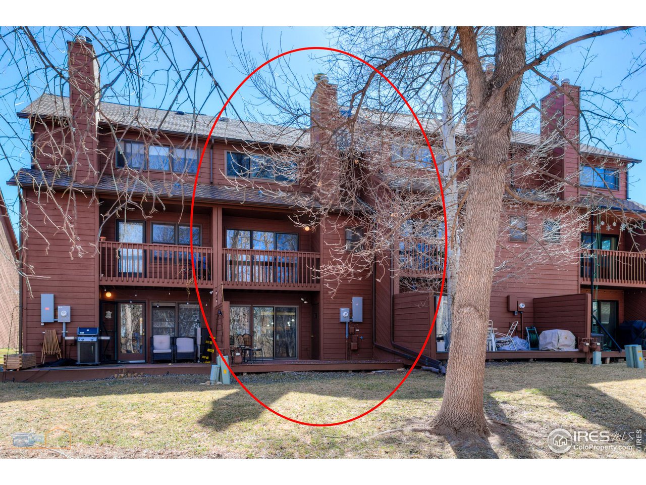 3104 Bell Drive Boulder, CO 80301 - Photo 19 of 40 a view of a patio with a table and chairs under an umbrella