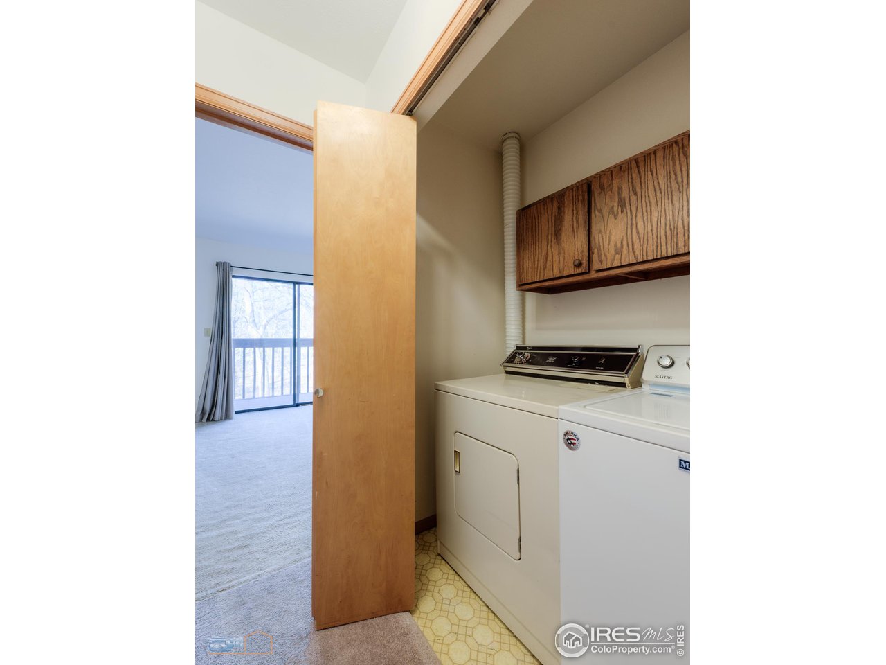 3104 Bell Drive Boulder, CO 80301 - Photo 27 of 40 a kitchen with a refrigerator and a stove