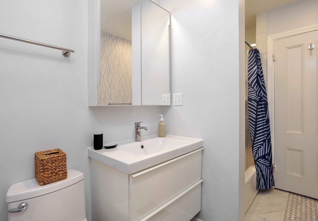 7 Lester Place Boston, MA 02130 - Photo 16 of 33 a utility room with dryer and washer