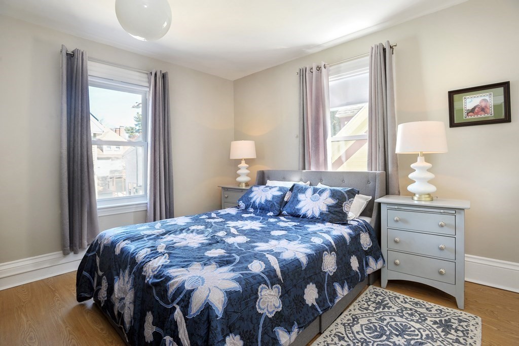 7 Lester Place Boston, MA 02130 - Photo 18 of 33 a bedroom with a bed and a window