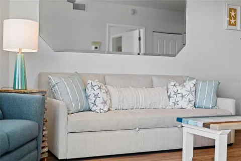 a living room with mirror