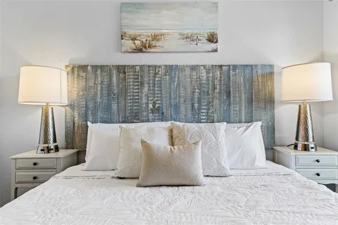 a view of a balcony with chairs