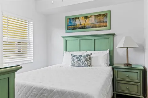 a room with gym equipment and a large window