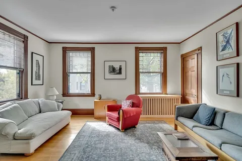 a living room with furniture or couch and a window