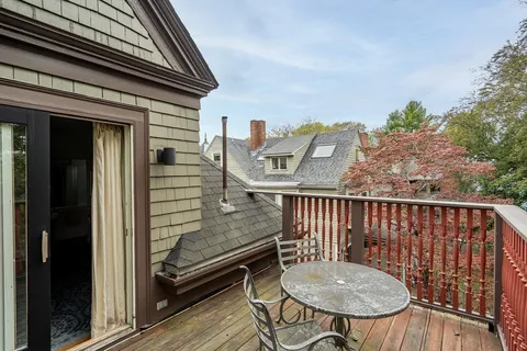 a side view of a chairs on the deck