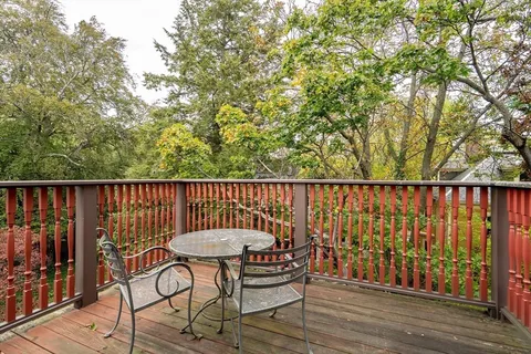 a bathroom with a toilet sink and shower
