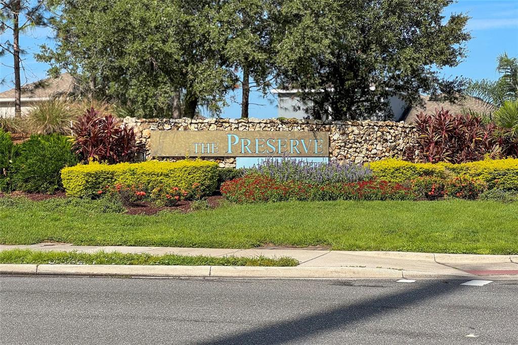1701 Snapper Street St. Cloud, FL 34771 - Photo 25 of 29 a view of a yard with flower plants