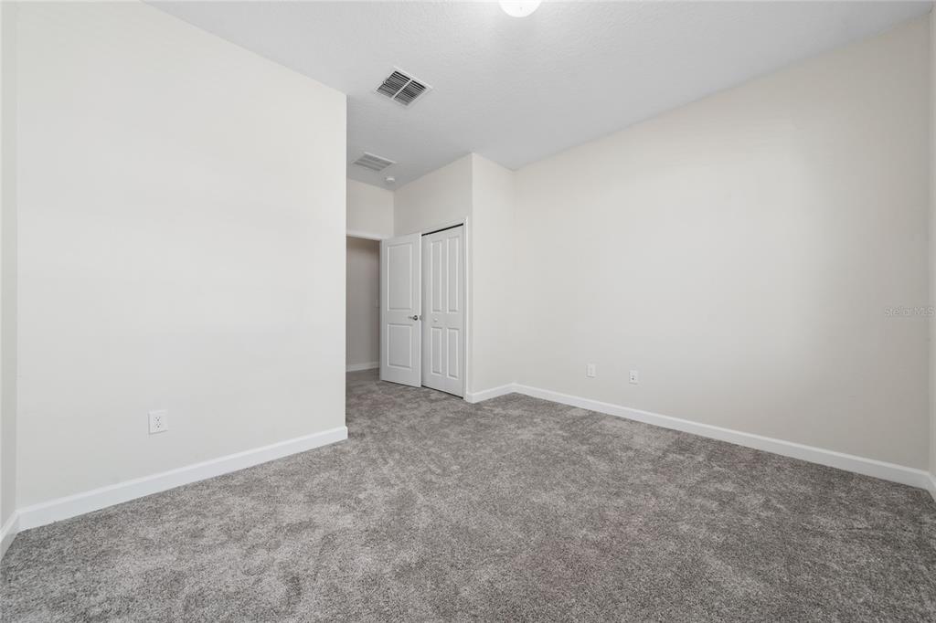 1701 Snapper Street St. Cloud, FL 34771 - Photo 3 of 29 a view of an empty room