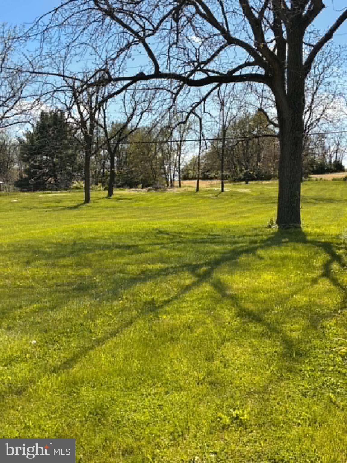15219 Fairview Road Clear Spring, MD 21722 - Photo 1 of 10 a building with trees in front of it