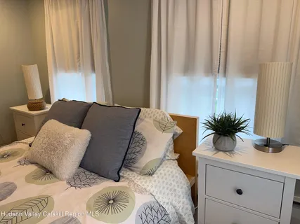 a room with a furniture and a window