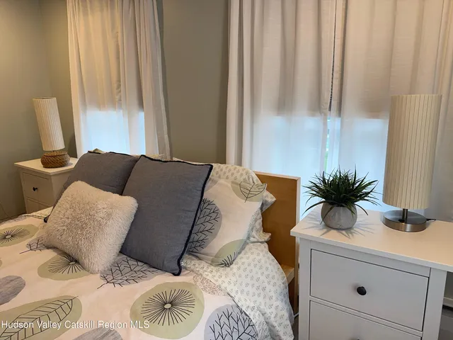 a room with a furniture and a window