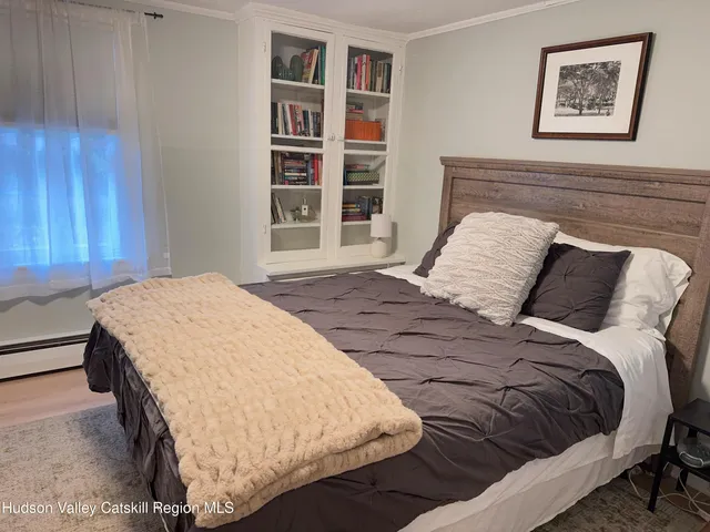 a kitchen with a sink and a refrigerator