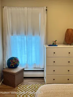 a kitchen with cabinets and window