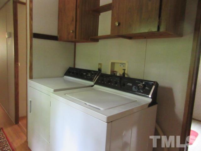 9565 George Ruff Road Bullock, NC 27507 - Photo 11 of 15 a kitchen with a sink and cabinets