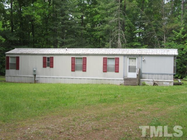 9565 George Ruff Road Bullock, NC 27507 - Photo 2 of 15 a view front of house with backyard