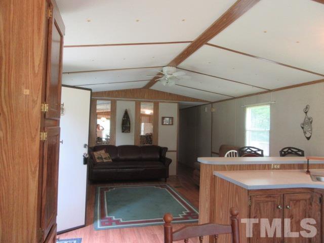 9565 George Ruff Road Bullock, NC 27507 - Photo 7 of 15 a living room with a sink and furniture