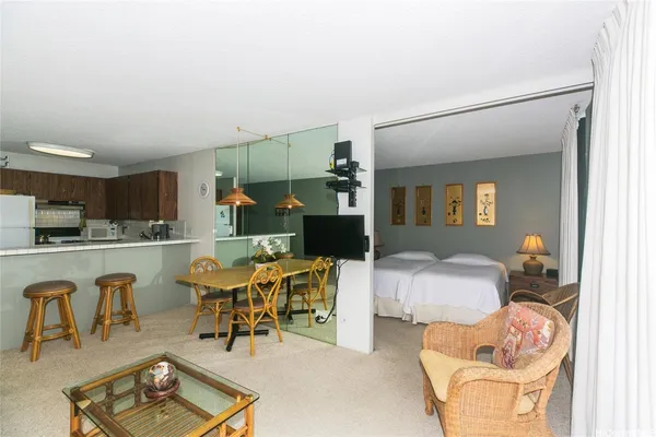 a living room with furniture and a table