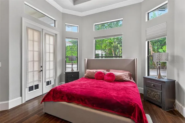 a bedroom with a bed and a couch