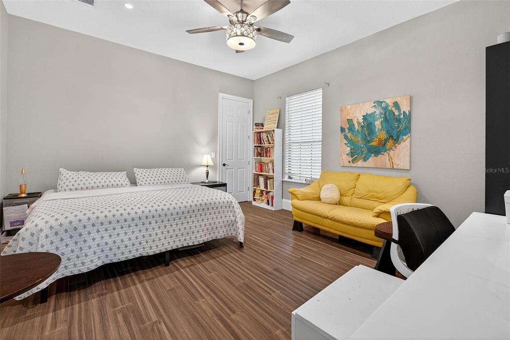 11015 Hawkshead Court Windermere, FL 34786 - Photo 35 of 90 a bedroom with a bed and a couch