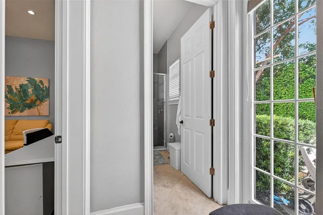 an aerial view of a house with outdoor space and street view