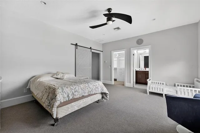 an aerial view of a house with outdoor space and street view