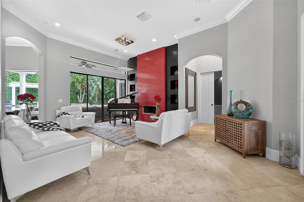 11015 Hawkshead Court Windermere, FL 34786 - Photo 4 of 90 a living room with furniture and a table