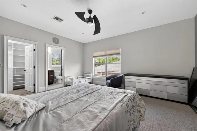 a view of a house with swimming pool and porch