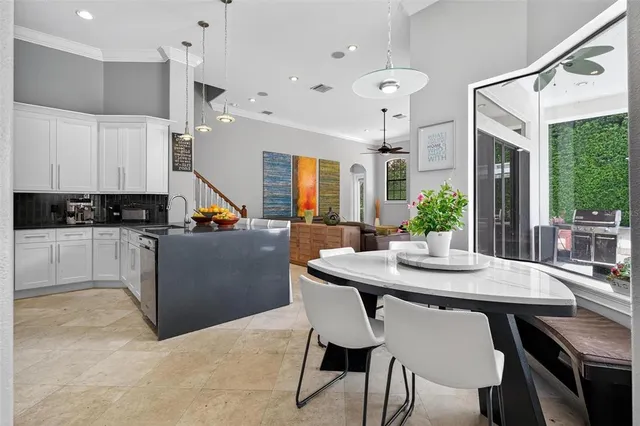 a kitchen with a sink and a window